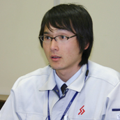 塚本 義達